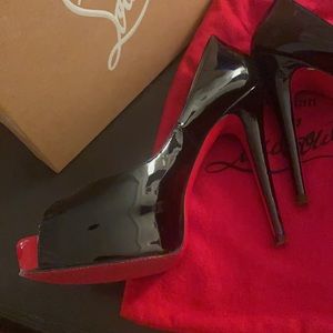 Authentic black rare patient leather with red toe & platform. Comfortable!